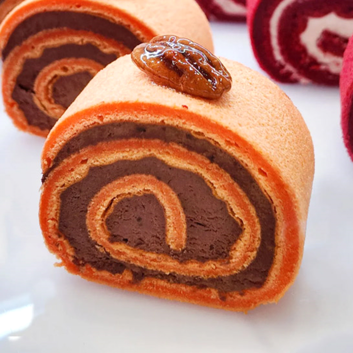 Preparato in polvere per Swiss roll, American cake e torte di colore arancione. 